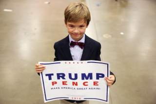Cole Baird, 8, supporter of Republican presidential nominee Donald Trump, poses for a portrait following a campaign rally in Fredericksburg, Virginia, U.S., August 20, 2016. REUTERS/Carlo Allegri
